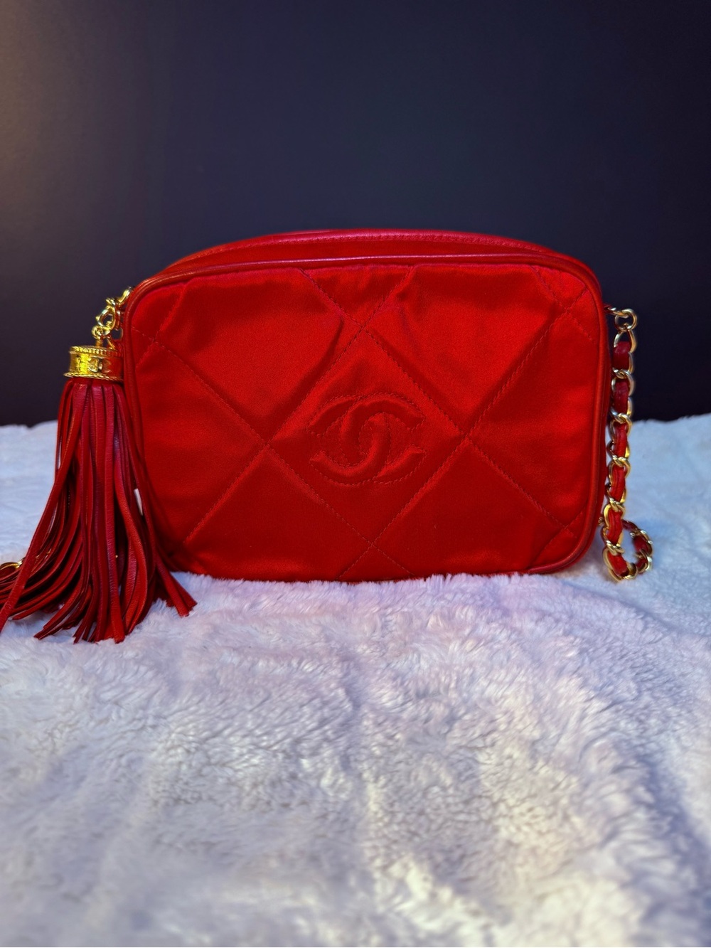 CHANEL Red Quilted Satin Crossbody Bag with Tassel and Chain
